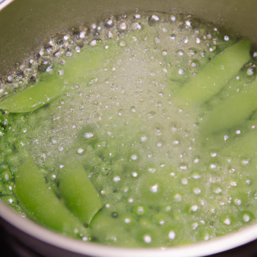 Blanching sugar snap peas in boiling water