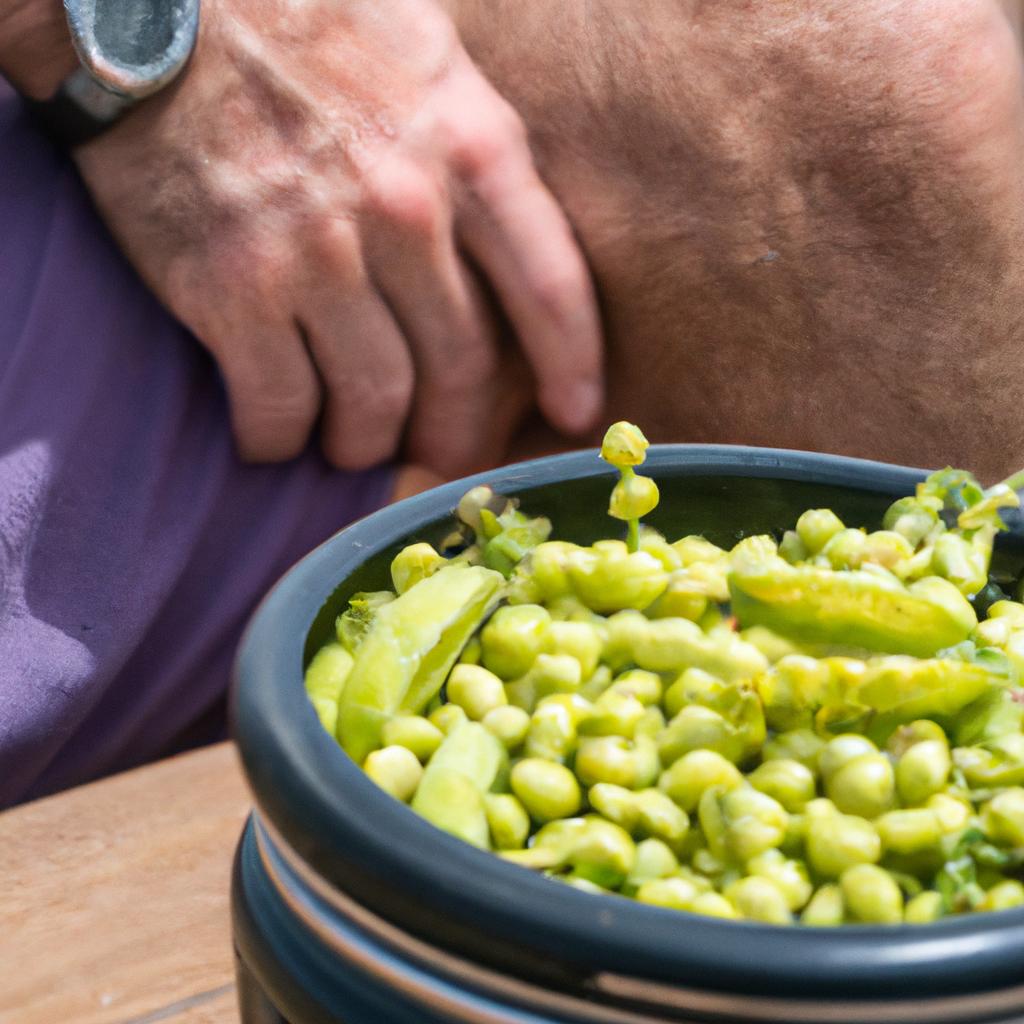 A farmer checking the weight of a bushel of shelled peas