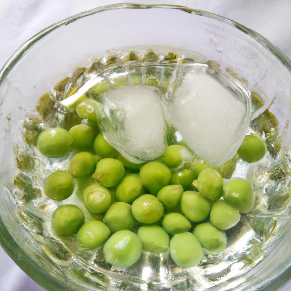 Ice water bath method helps preserve the color and texture of the peas.