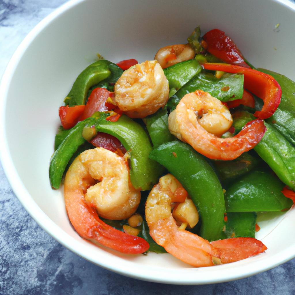 Make a flavorful low FODMAP meal with stir-fried snow peas, bell peppers, and shrimp.